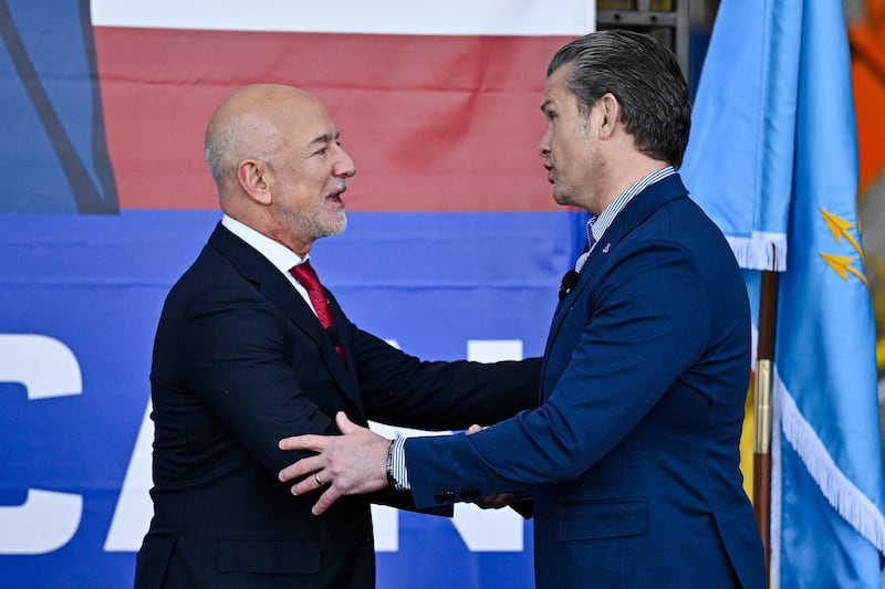 Jeff Bezos greets US defense secretary Pete Hegseth at a Blue Origin event in Cape Canaveral, Florida, earlier this week. Photograph: Miguel J. Rodriguez Carrillo/AFP/Getty Images
