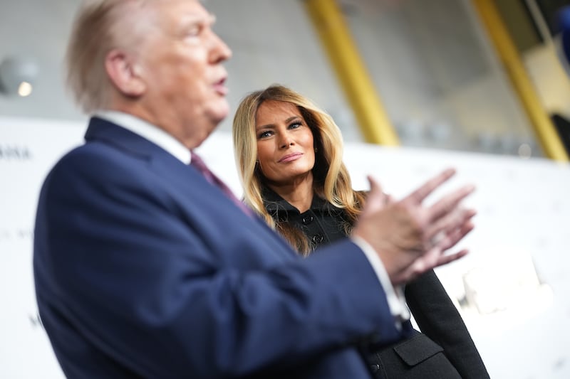 First lady Melania Trump looks on as president Donald Trump speaks to reporters before the premiere of the documentary film Melania at the Kennedy Center, Washington, on Thursday. Photograph: Doug Mills/The New York Times
                      