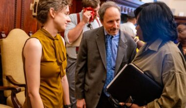 Mayor Cherelle L. Parker (right) speaks with Budget Director Sabrina Maynard (left) and Finance Director Rob Dubow (center) following a press conference at City Hall Wednesday, Jul. 9, 2025.