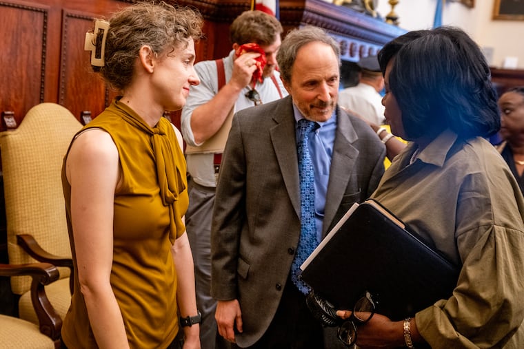 Mayor Cherelle L. Parker (right) speaks with Budget Director Sabrina Maynard (left) and Finance Director Rob Dubow (center) following a press conference at City Hall Wednesday, Jul. 9, 2025.