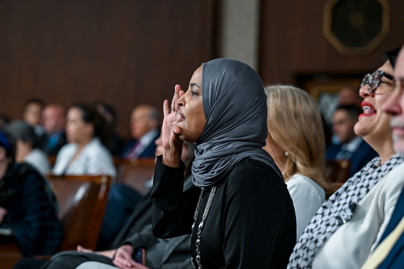Democratic representative Ilhan Omar of Minnesota shouts at president Donald Trump as he delivers his state of the union address. Photograph: Kenny Holston/the New York Times
                      