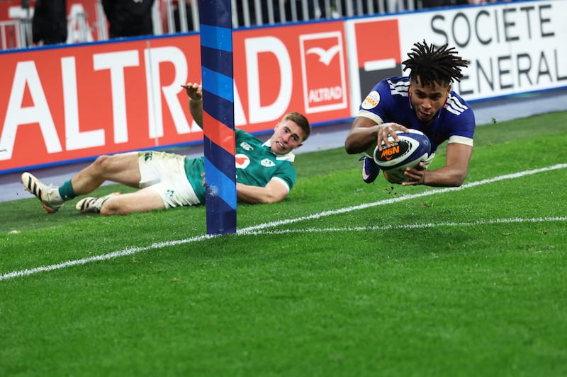 France's wing Théo Attissogbe dives across the line to score a try during the Six Nations  against Ireland yesterday. Photograph: Alain Jocard/AFP via Getty Images