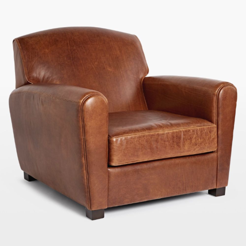 Distressed tan leather armchair