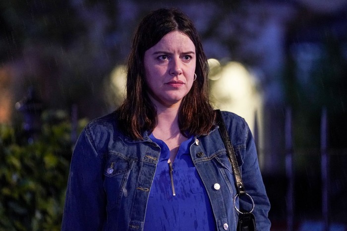 Zoe Slater Zoe Slater, played by Michelle Ryan, in a denim jacket and blue shirt, stands in EastEnders' Albert Square