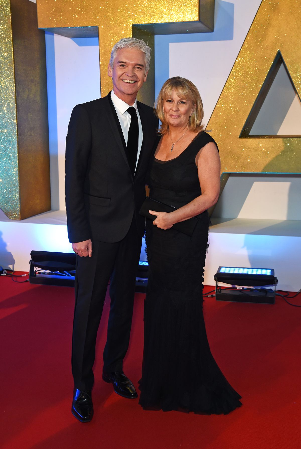 Phillip Schofield (L) and wife Stephanie Lowe