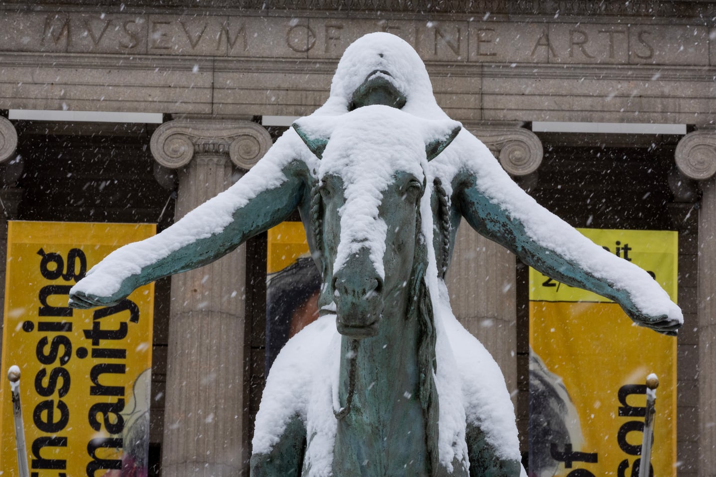 Appeal to the Great Spirit by Cyrus Dallin in the snow outside the Museum of Fine Art.