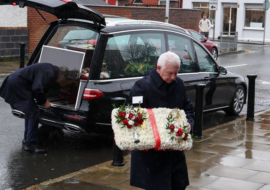 Floral tributes at the funeral of Frank Daly from East Wall, Dublin, who died last week when he was struck by a Bus Éireann bus on North Earl Street. Photo: Colin Keegan/Collins