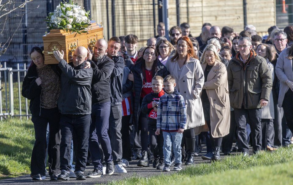 The remains of Caoimhin Porter-McLoone are taken to St Brigid's Church. Photo: North West Newspix