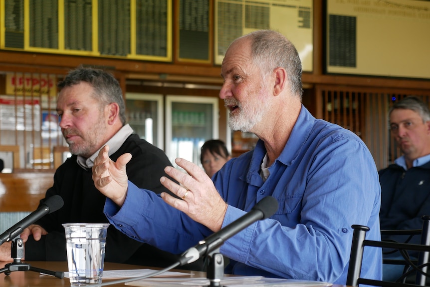 Bart Butson speaking into a microphone at the senate inquiry public hearing.