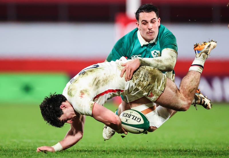 England A's Raffi Quirke is tackled by James Hume of Ireland XV at Thomond Park last Friday. Photograph: Dan Clohessy/Inpho