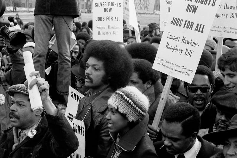 The Rev Jesse Jackson taking part in a march for jobs, around the White House, in 1975. Photograph: Buyenlarge/Getty Images