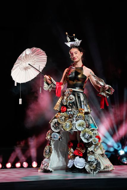 Marie-Antoinette À La Rose worn by Laura Peterfalvi, Lycée Professionnel Ferdinand Buisson, France, made from newspapers, transport tickets and magazines during the Junk Kouture World Final at the Helix in Dublin. Niall Carson/PA Wire