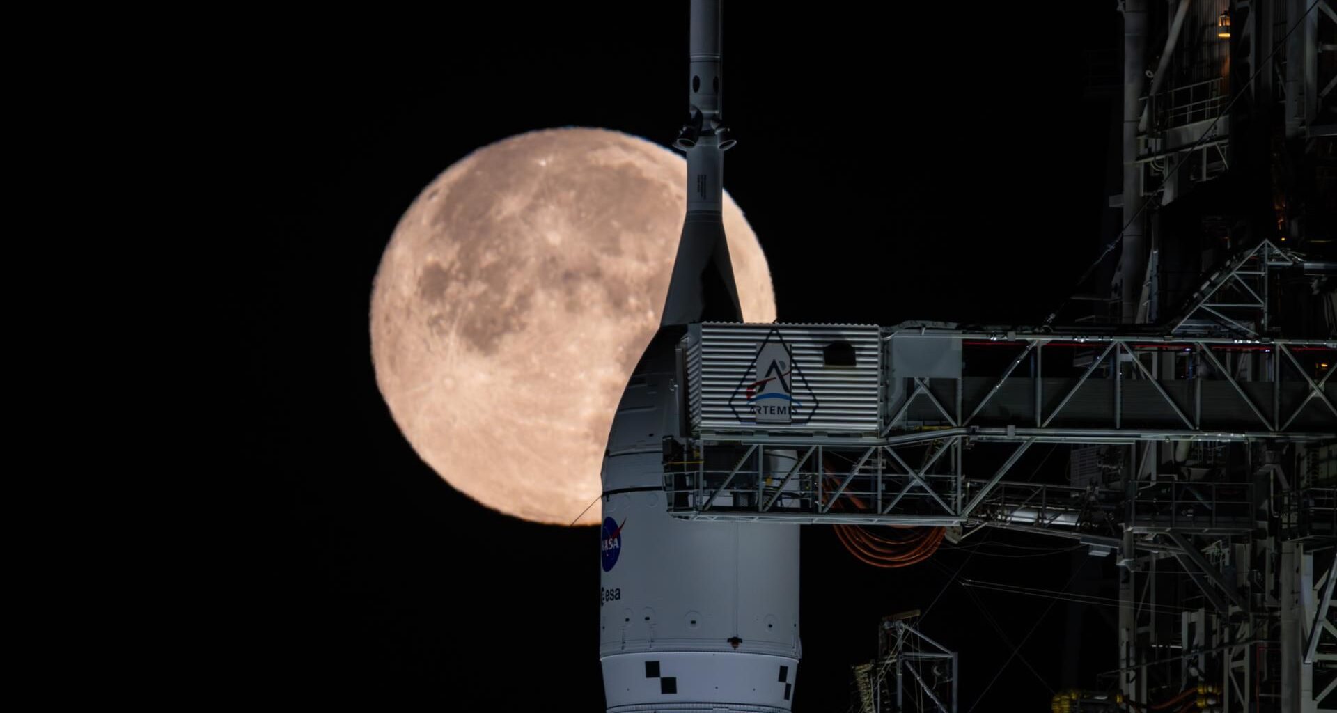 Artemis 2 rocket chills with the 'Snow Moon' photo of the day for Feb. 11, 2026