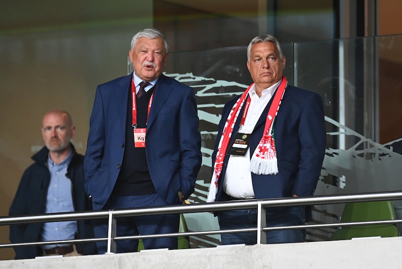 Hungary's prime minister, Viktor Orban (right), with the president of the Hungarian Football Association, Sandor Csanyi, watching Ireland and Hungary's World Cup qualification match. Photograph: Charles McQuillan/Getty Images