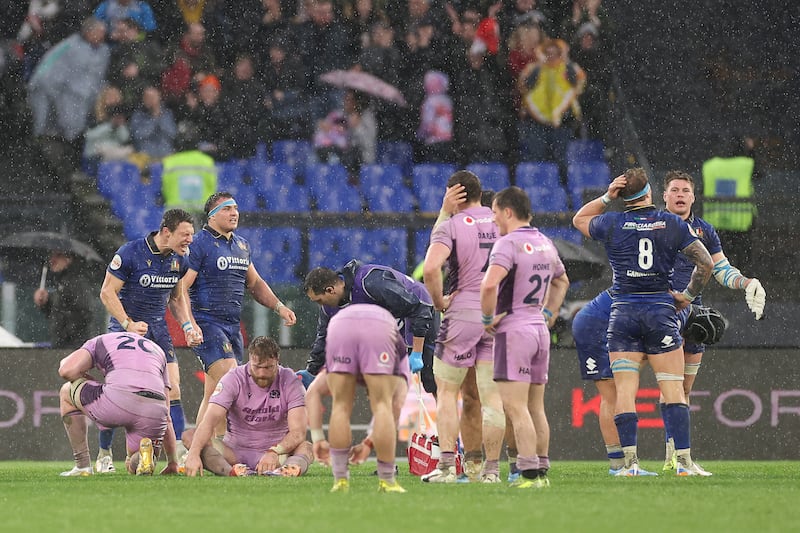 Italy celebrate the victory over Scotland at full-time. Photograph: Warren Little/Getty Images