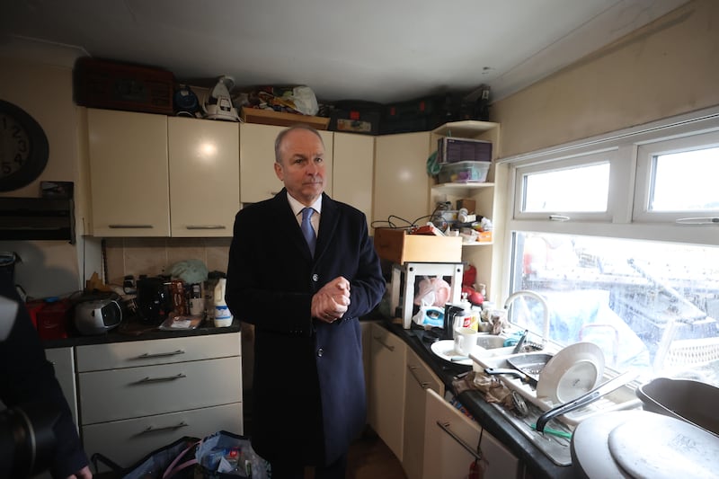 Taoiseach Micheál Martin in a flood damaged home on Island Road, Co Wexford, on Monday. Photograph: Liam McBurney/PA