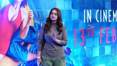 Ayesha Khan was posing for pictures on the red carpet at the premiere when she warned the paparazzi.