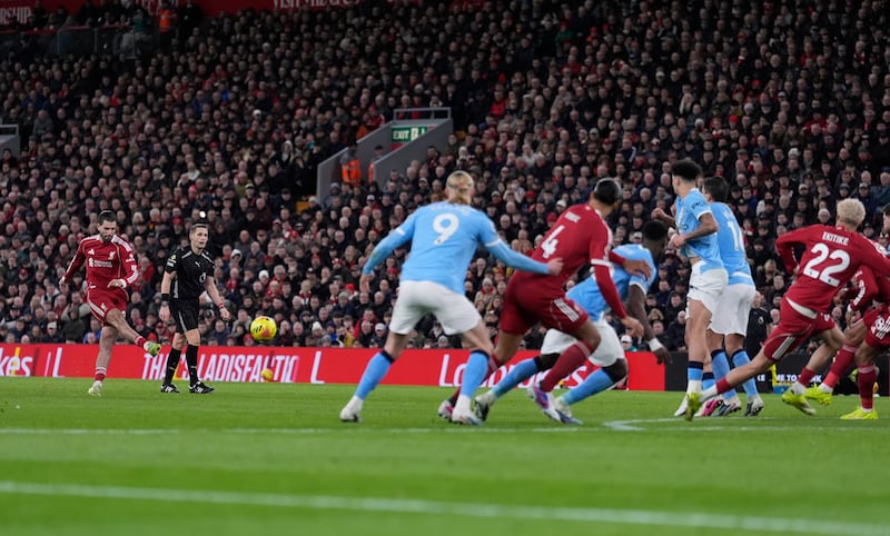 Liverpool's Dominik Szoboszlai scores the opening goal from a free-kick against Manchester City. Photograph: Peter Byrne/PA Wire