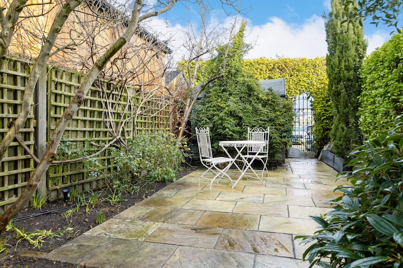 At the end of the garden a pedestrian gate  has access to the Lansdowne Rugby grounds (former YMCA Cricket Club)