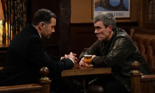 Cain and Graham have a drink 