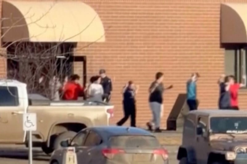 A screengrab from a video showing students leaving Tumbler Ridge secondary school in British Columbia after the shooting. Photograph: Jordon Kosik via AP