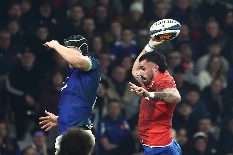 Italy's Riccardo Favretto catches a lineout ball during the Six Nations match against France on Sunday. Photograph: AFP via Getty Images