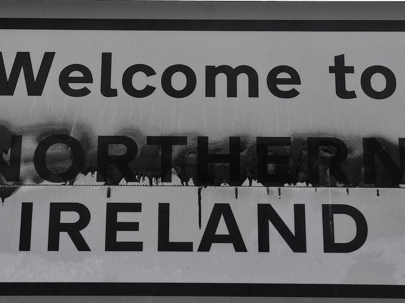 A defaced ‘Welcome to Northern Ireland’ sign is displayed on the Irish Border in Derry. Photograph: Charles McQuillan/Getty Images