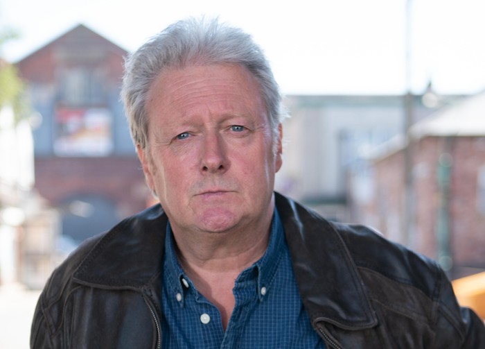 Jim McDonald looking serious in a scene from Coronation Street