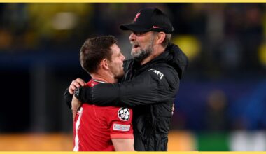Jurgen Klopp embraces James Milner of Liverpool, in 2022