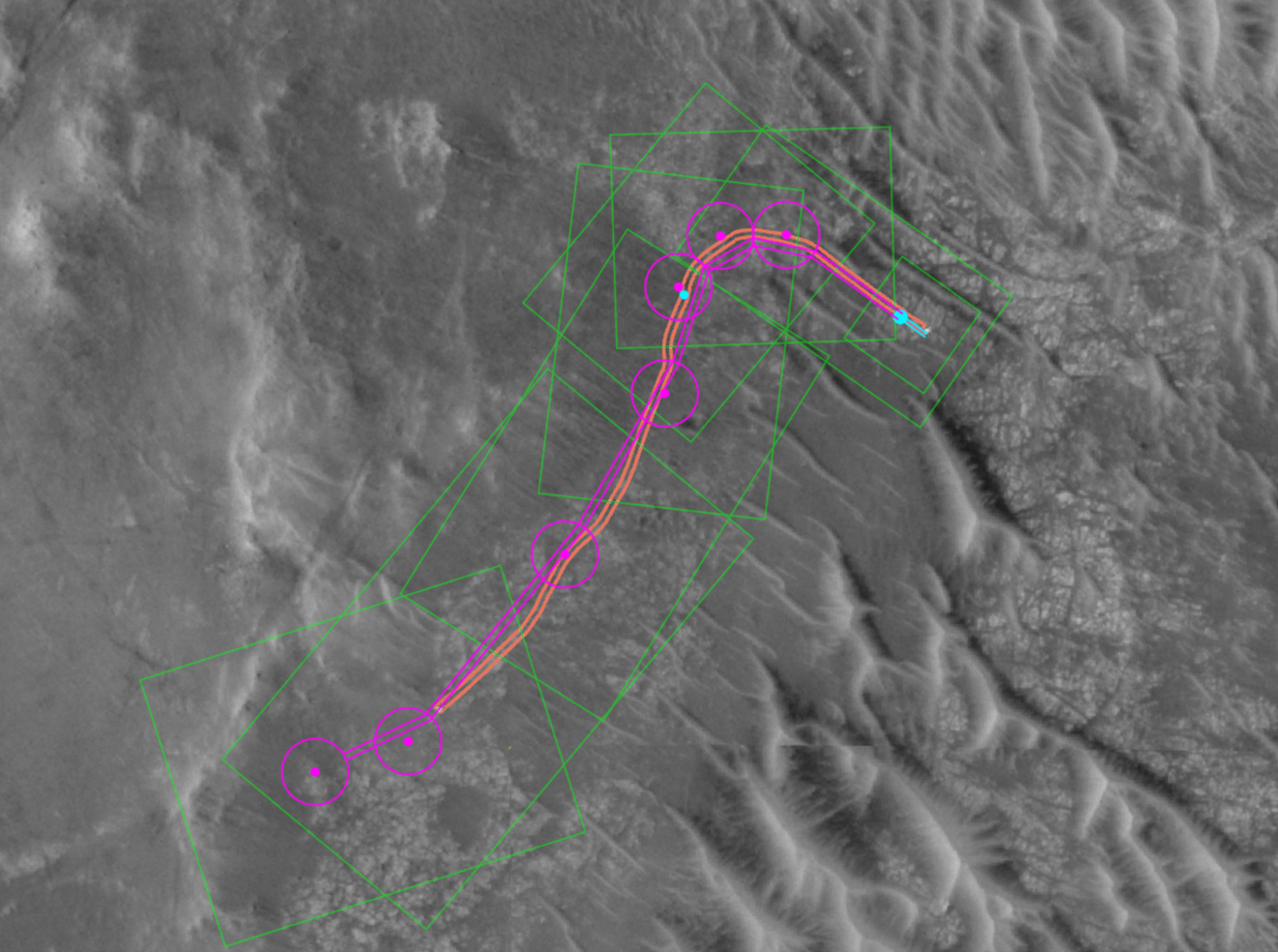 A grayscale image of the Martian landscape with green boxes and purple and orange lines running across it