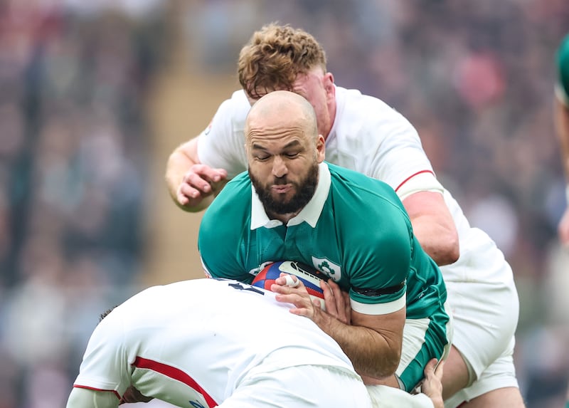 Ireland's Jamison Gibson-Park is tackled during Saturday's Six Nations game against Engand. Photograph: Billy Stickland/Inpho