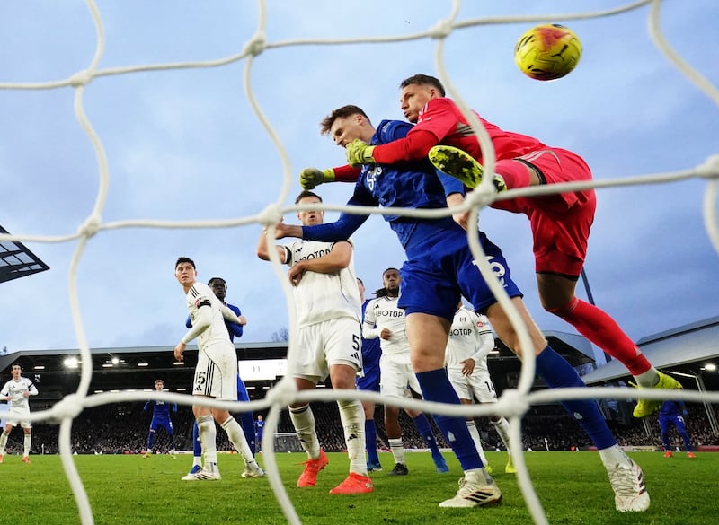 Jake O'Brien competing with Fulham goalkeeper Bernd Leno in the air. Photograph: Ben Whitley/PA Wire