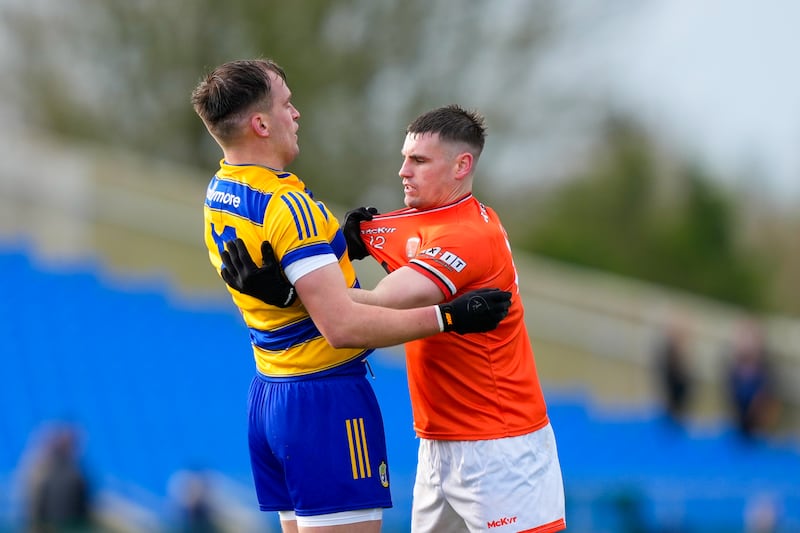 Enda Smith tussles with Greg McCabe as Roscommon lead Armagh in Division 1.
Photograph: James Lawlor/Inpho