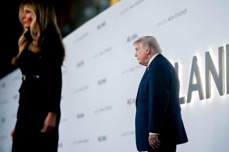 US president Donald Trump and first lady Melania Trump arrive for the world premiere of the documentary. Photographer: Stefani Reynolds/Bloomberg