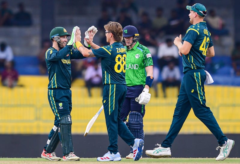 Australia's Adam Zampa (centre) celebrates during the match against Ireland. Photograph: Pankaj Nangia/Inpho