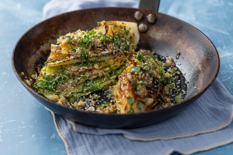 Roasted cabbage with confit garlic and preserved lemon dressing. Photograph: Harry Weir