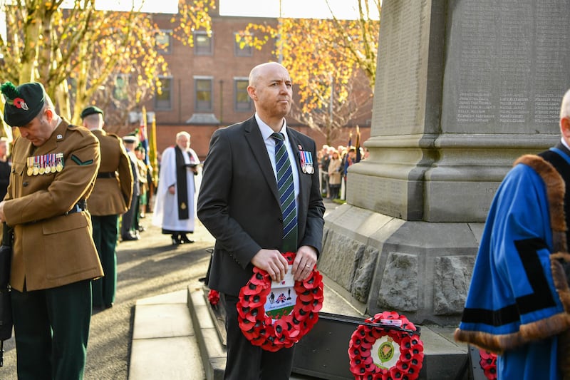 Jon Burrows lays a wreath on Remembrance Sunday last November at the Memorial Gardens, Ballymena.
Photograph: Andrew McCarroll/Pacemaker