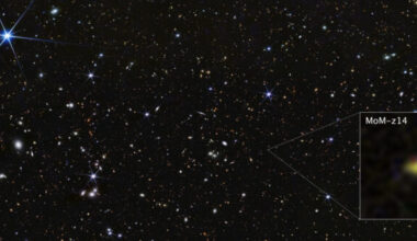 Galaxy MoM-z14: A field of stars with an embedded detail image of a unfocused blob of light.