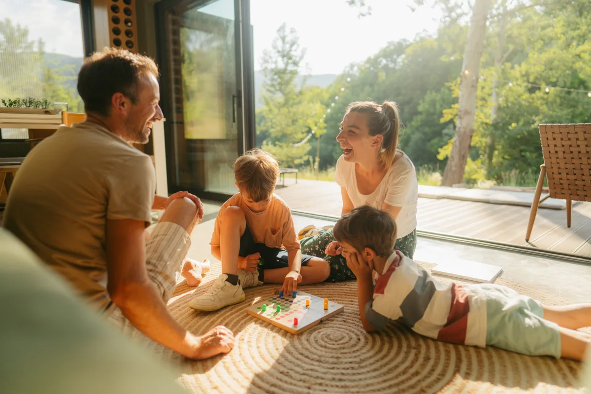 A group of people playing a board game together