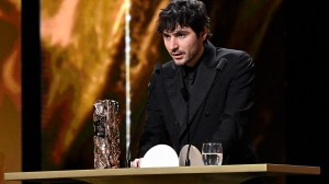 Guillaume Marbeck, who played Jean-Luc Godard in 'Nouvelle Vague' accepts the Best Director Cesar Award on behalf of Richard Linklater during the 51st Cesar Film Awards at L'Olympia on February 26, 2026 in Paris, France.