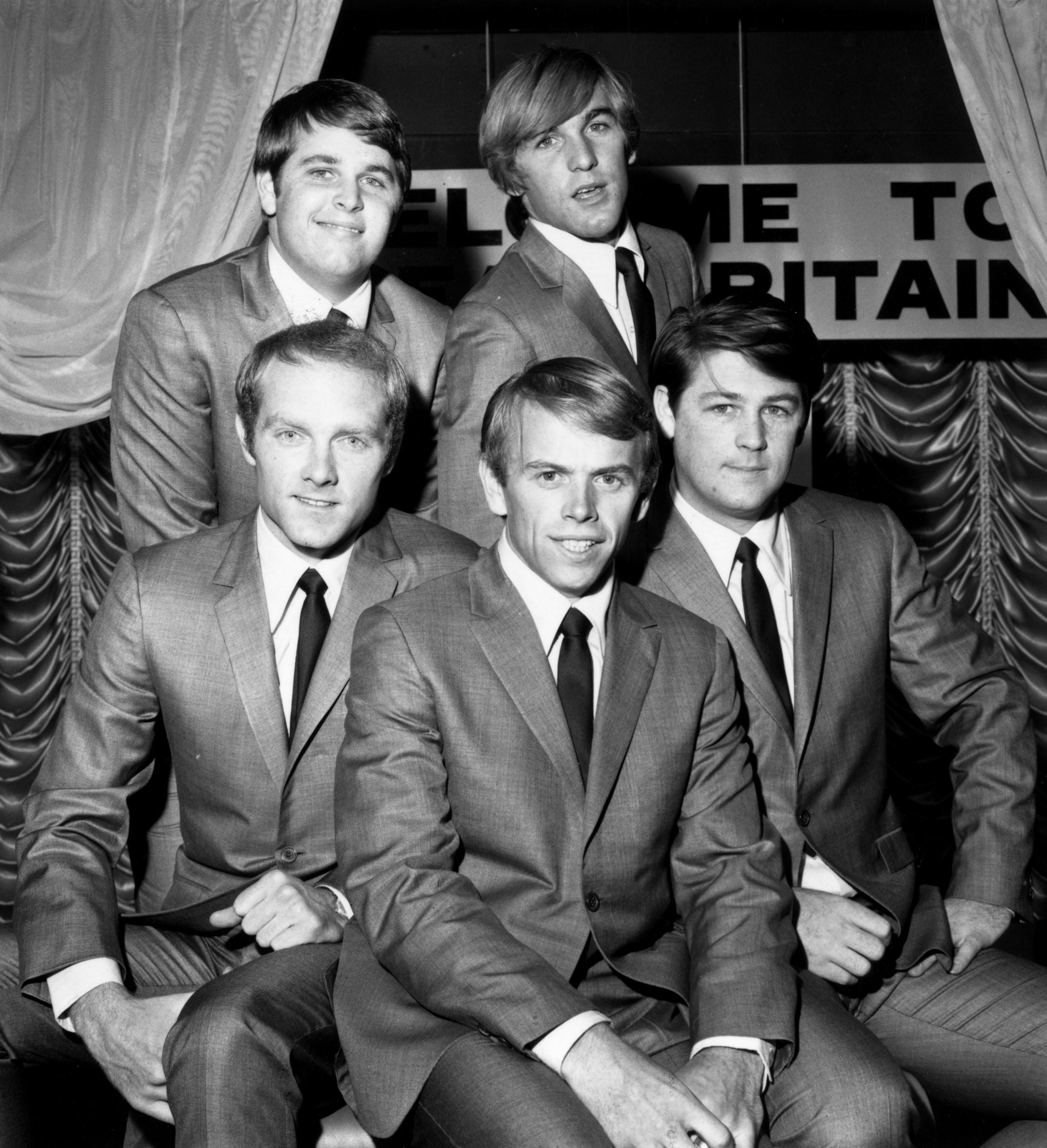 Clockwise from top left, the Beach Boys in 1964: Carl Wilson (1946-1998), Dennis Wilson (1944-1983), Brian Wilson, Al Jardine and Mike Love