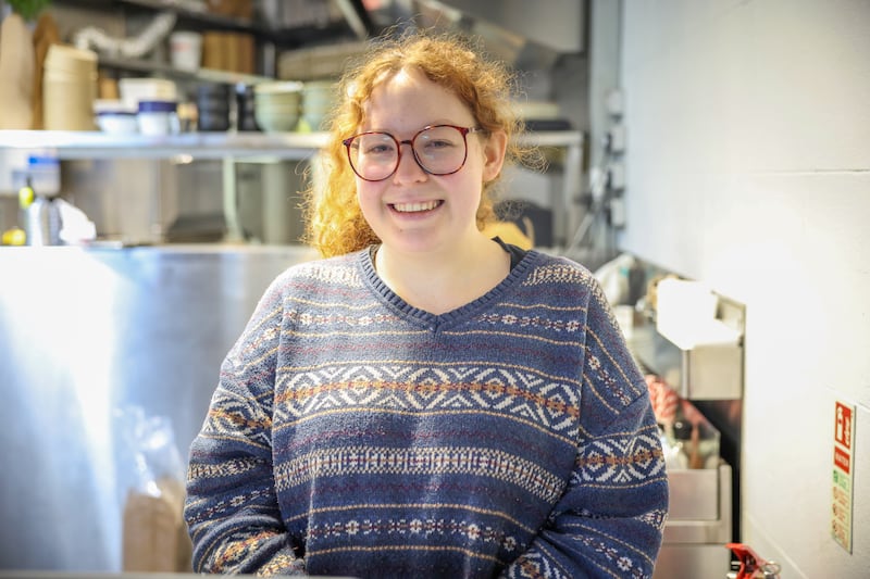 Delila Davis at Two Pups coffee shop in Dublin's Fairview, where she estimates about 50 per cent of customers leave tips. Photograph: Enda O'Dowd