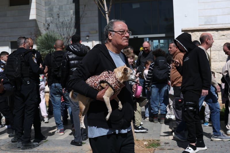 Israelis are evacuated from their building that got hit by a missile fired from Iran, in Tirat Hacarmel near Haifa, Israel on Saturday. Photograph: Atef Safadi/EPA