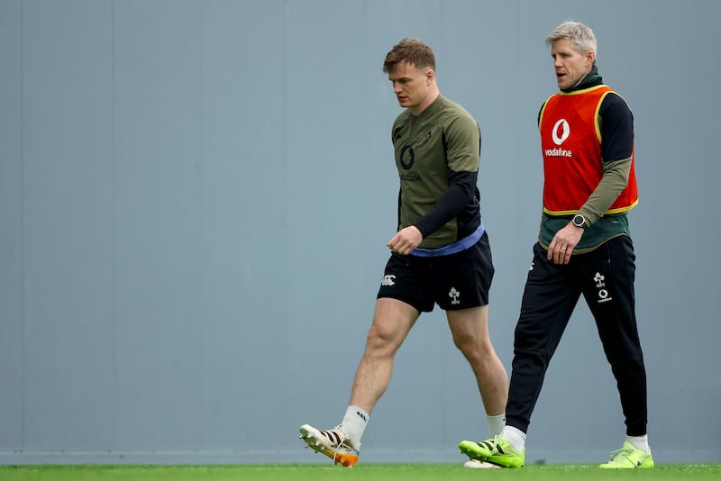 Josh van der Flier and Assistant Coach Simon Easterby. Photograph: Ben Brady/Inpho