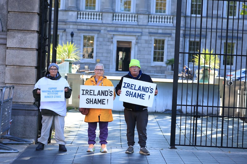 Survivors of industrial and reformatory schools protest outside Leinster House. Photograph: Stephen Collins/Collins