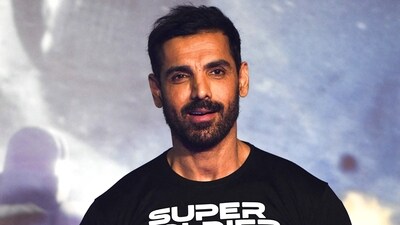 John Abraham talked about teamwork over rivalry with male co-stars, creating ease and camaraderie that shines on screen. (AFP)