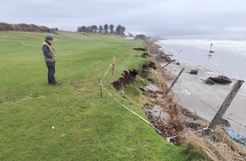 A member of Laytown Pitch and Putt Club in Co Meath inspects the damage caused by recent wet and wild weather