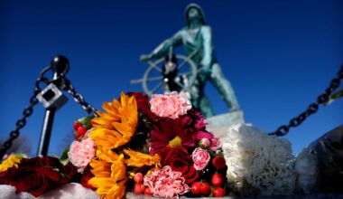 Flowers rested Saturday at the Fisherman's Memorial in Gloucester.