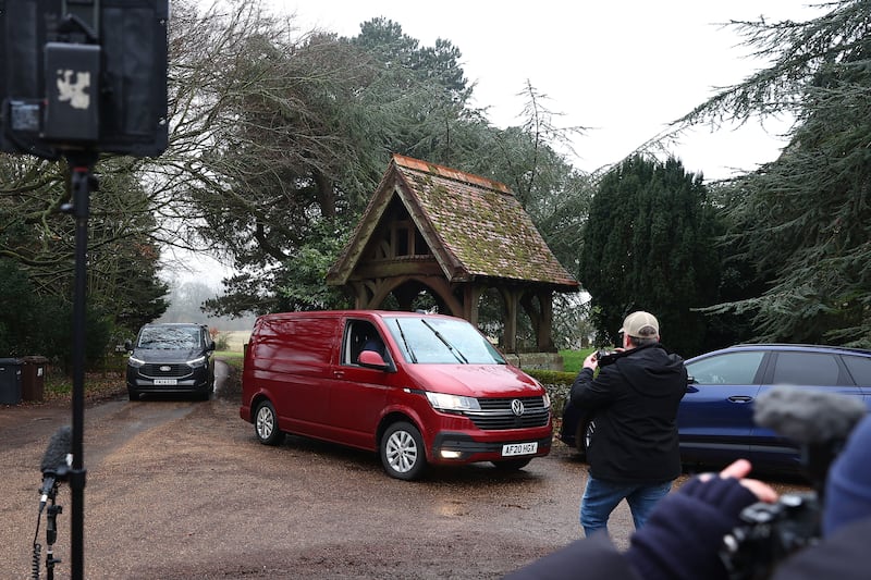 Vehicles arrive as the media gather near the entrance to Wood Farm, the home of Andrew Mountbatten-Windsor on Thursday. Photograph: Peter Nicholls/Getty Images