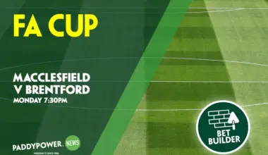 A Newcastle player fires a shot past a Bournemouth goalkeeper in the FA Cup